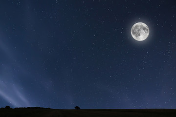 Obraz premium Night sky background with moon and stars. Full moon background.