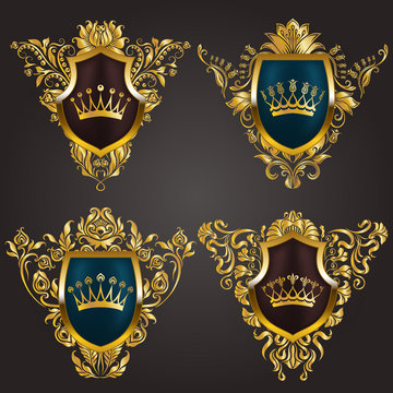 Set of golden royal shields with filigree floral elements for page, web design. Old frames, borders, crowns in vintage style for label, emblem, badge, logo, monograms. Vector illustration EPS10