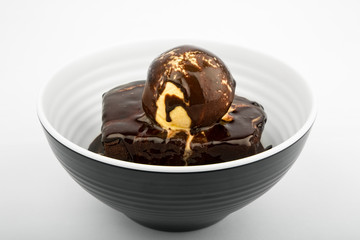 Brownie with vanilla ice cream ball