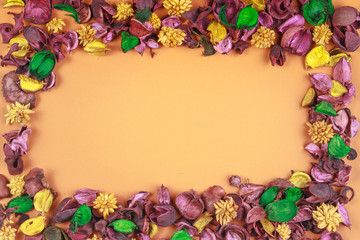 Dry flowers composition. Frame made of dried flowers and leaves. Top view, flat lay.