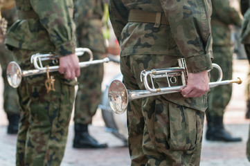 Army parade – military band standing in camouflage military uniform