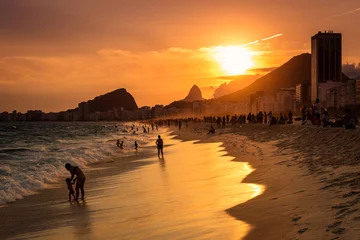 Fototapeten Sunset View in Copacabana Beach with Mountains in Horizon and Tall Hotel Building, Rio de Janeiro © Donatas Dabravolskas