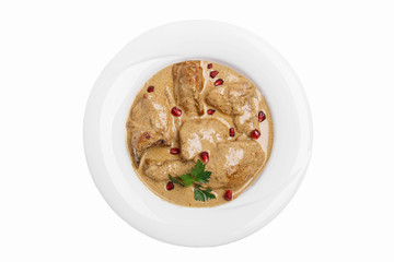 fried chicken in walnut sauce traditional Georgian dish white background top view isolated