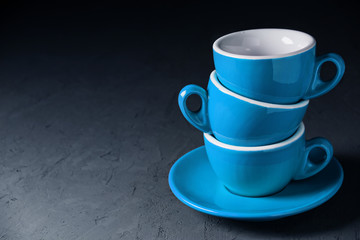 Stack of empty coffee cups