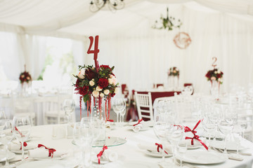 Beautiful Banquet hall under a tent for a wedding reception.