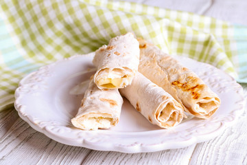 Grilled pita bread with cheese filling