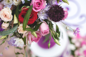 Beautiful wedding colorful bouquet for bride. Beauty of colored flowers. Close-up bunch of florets. Bridal accessories. Female decoration for girl. Details for marriage and for married couple