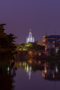 Wat Mahathat Woravihara at Phetchaburi with twilight time.