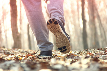 Man running in forest