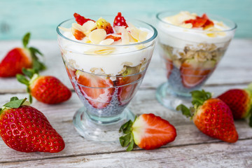 Strawberries and chia seeds grains quinoa and yoghurt. Healthy and delicious super diet.