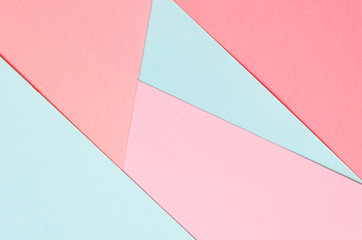 background of colored paper geometric shapes