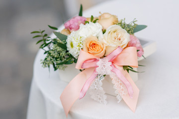 Delicate orange pink bouquet on the table