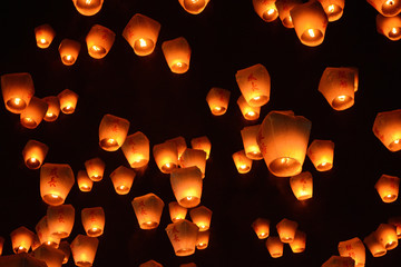 Thousands of lanterns fill the sky at the 2017 Pingxi Sky Lantern Festival in Taiwan, the Chinese text on them says chengzhang, which means to grow - 137211251