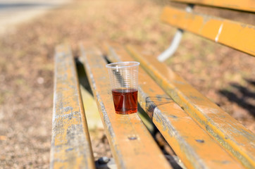 Plastic cup with red beverage
