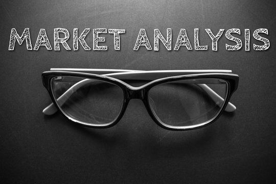 MARKET ANALYSIS, message on the Black with eyeglasses, black and white tone / business concept