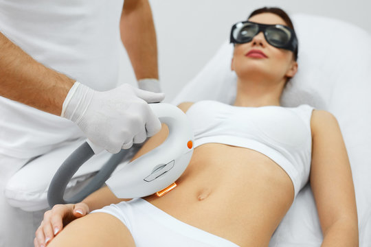 Cosmetic Procedure. Beautiful Woman Receiving Skin Treatment