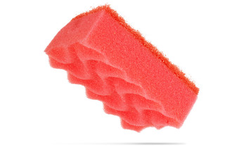 Simple old red sponge isolated on white