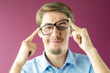 Funny businessman with crooked glasses on his face