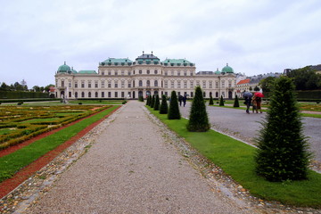 Travel to Vienna, Austria. The view on the Belvedere Palace and park in front of him in the rainy day.