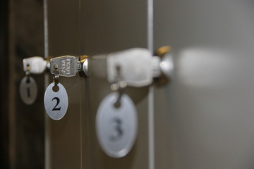 metal cabinets with keys on a blurry background