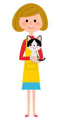 猫を抱くエプロンの女性