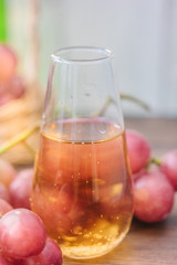 Fresh grape wine in glass