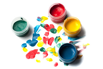 Colorful gouache, drops of paint on a white background