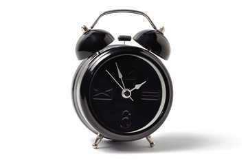 Black alarm clock isolated on a white background