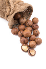 macadamia nut in sack on white background.