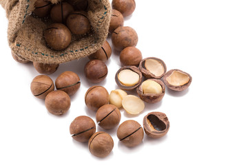 macadamia nut in sack on white background.