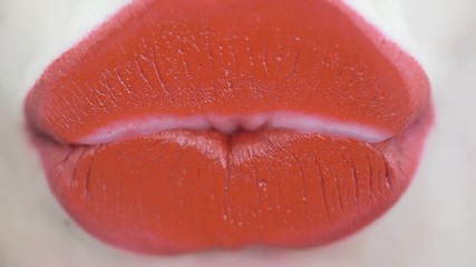 View behind the glass of woman which kissing the glass