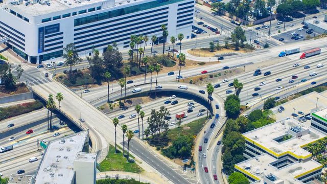 Timelapse Overview of Traffic Jam at Freeway Ramp in Los Angeles -Tilt Down-