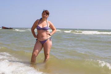 Woman in swimwear at the sea