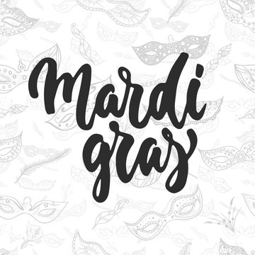 Mardi Gras - hand drawn carnival lettering phrase isolated on the white background. Fun brush ink inscription for photo overlays, greeting card or t-shirt print, poster design.