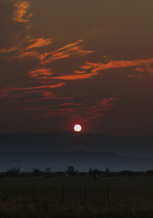 Smoke from wildfires blurs the sunset in Wyoming