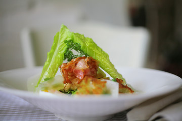 lettuce, bacon and cheese salad with parsley