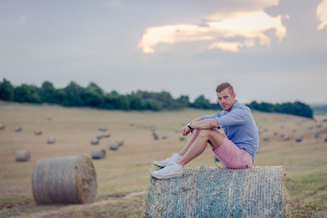 Man in country in summer day