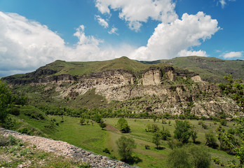 Fototapeta na wymiar Vardzia cave monastery in Samtskhe-Javakheti region, Georgia. Vibrant natural mountain landscape.