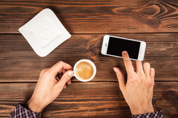 Male hands holding a smartphone