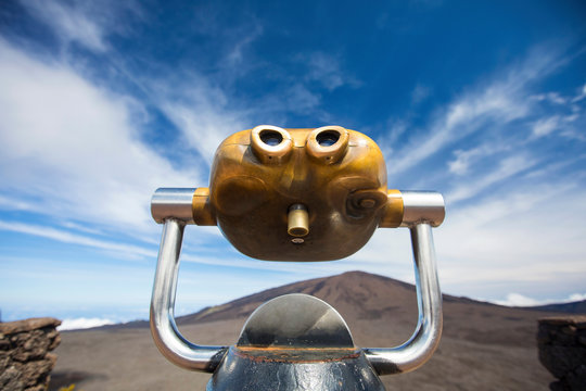 Volcanic landscape with coin operated binoculars  and Piton de la Fournaise, Reunion Island