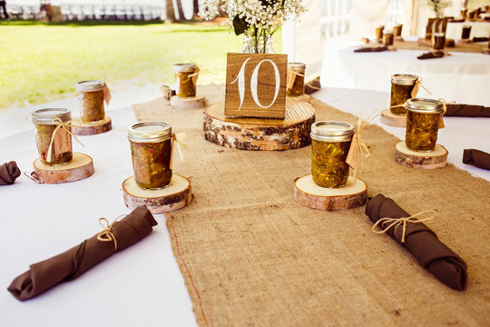 Wedding table with rustic place settings, outdoors