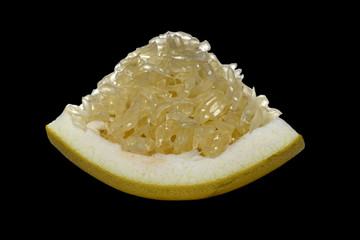 slice fresh pomelo on black background.