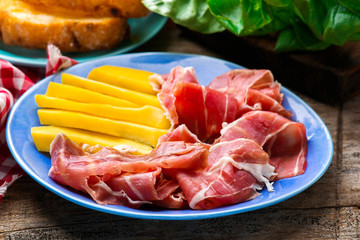 Prosciutto and mango.selective focus.