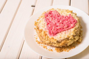 sweet cake on a wooden background