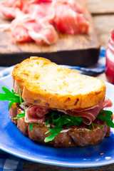 Cranberry  Prosciutto and cream  Cheese sandwich.