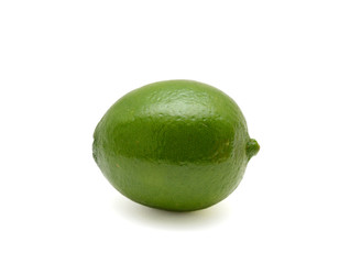 Single fresh lime isolated on white background