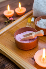 Obraz na płótnie Canvas spa accessories. Sea salt in wooden jars. Tools for relaxation. Tools for the aromatherapy
