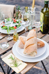 tables and chairs at a bistro in italy