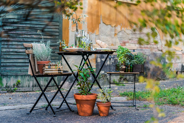 tables and chairs at a bistro in italy