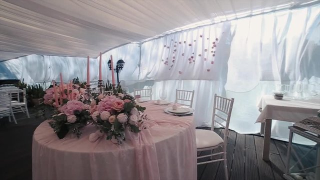 Beautiful Banquet hall under a tent for a wedding reception.